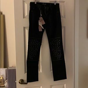 Straight leg pants with stud on the front knee